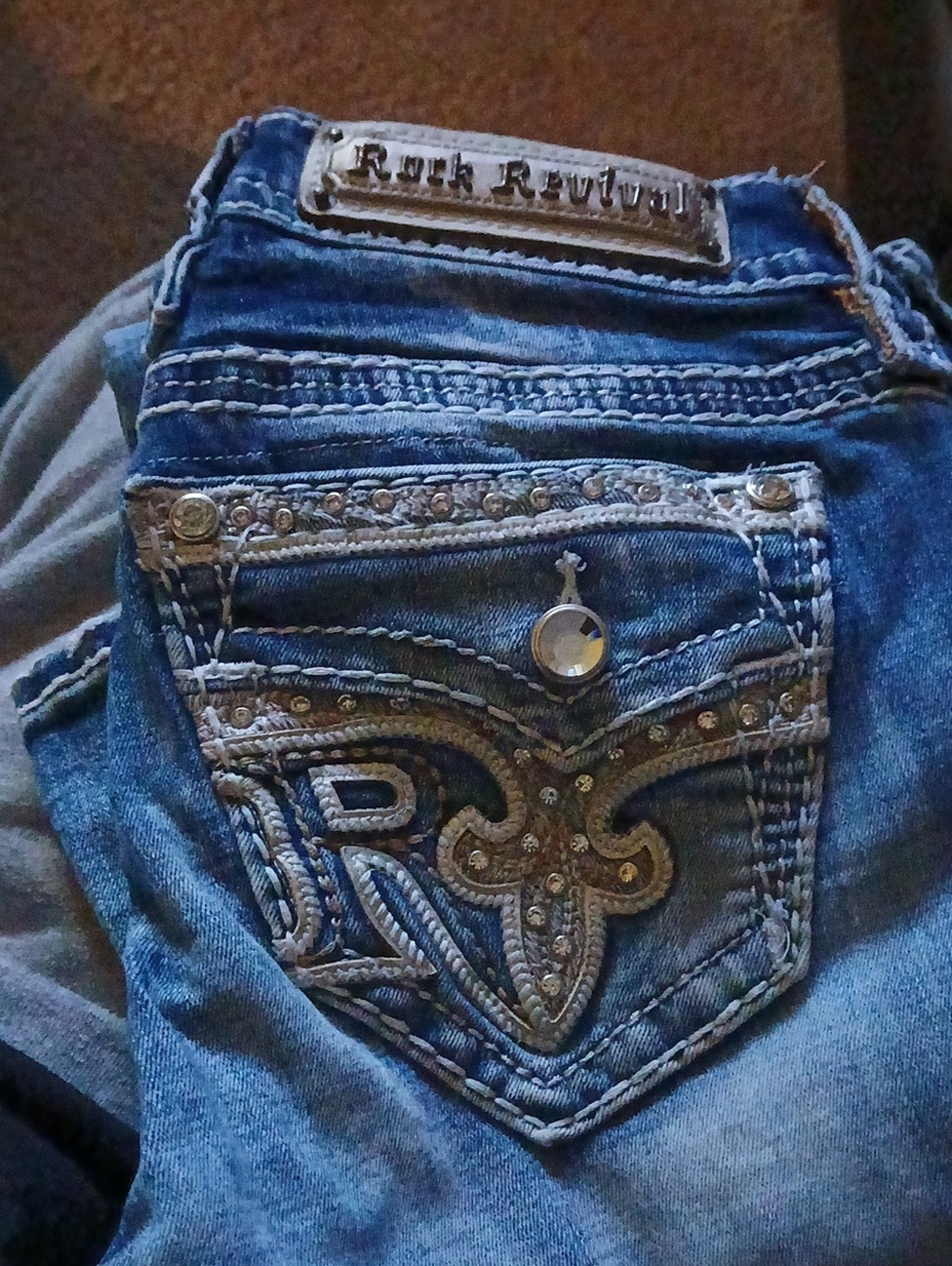 Rock Revival Distressed Blue Bootcut Jeans with Embellished Pocket